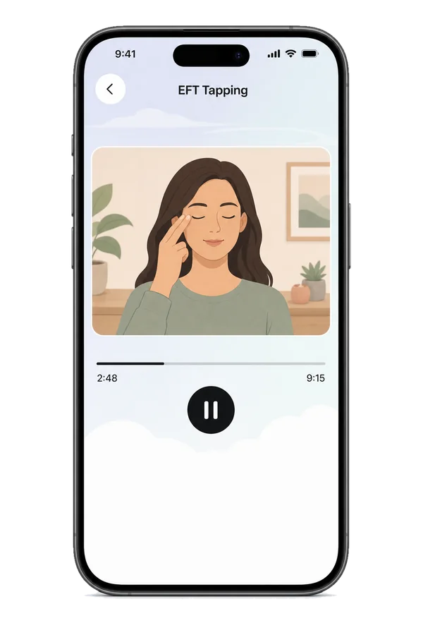 An EFT Tapping video playing in the app: a woman tapping beside her eye, with a progress bar and a pause button.